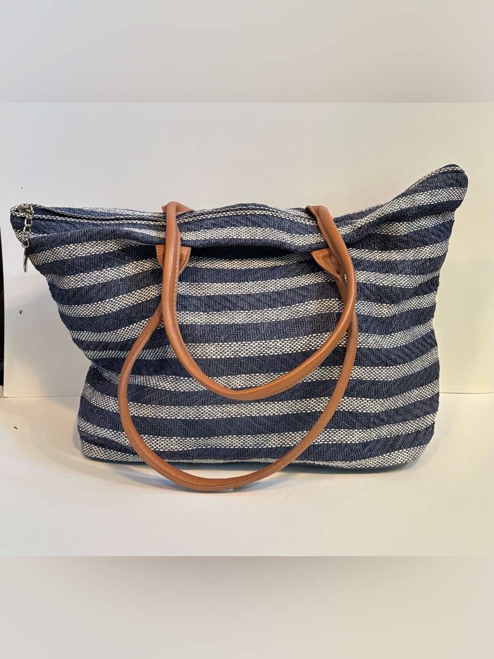 Striped Navy Canvas Woven Tote with Tan Handles.